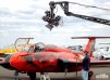 A crane-mounted 4K 3D camera rig filming Jet class pilot Major Heather Penney (Team Air Race 21)
