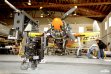 A crane-mounted 4K 3D camera rig filming the Grumman F8F Bearcat “Rare Bear” in its hangar