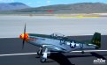 A restored P-51 Mustang aircraft ('Wee Willy II') landing at Stead Field Airport in Reno (NV)